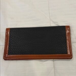 Dooney & Bourke Black Pebbled Leather Wallet with Brown Trim